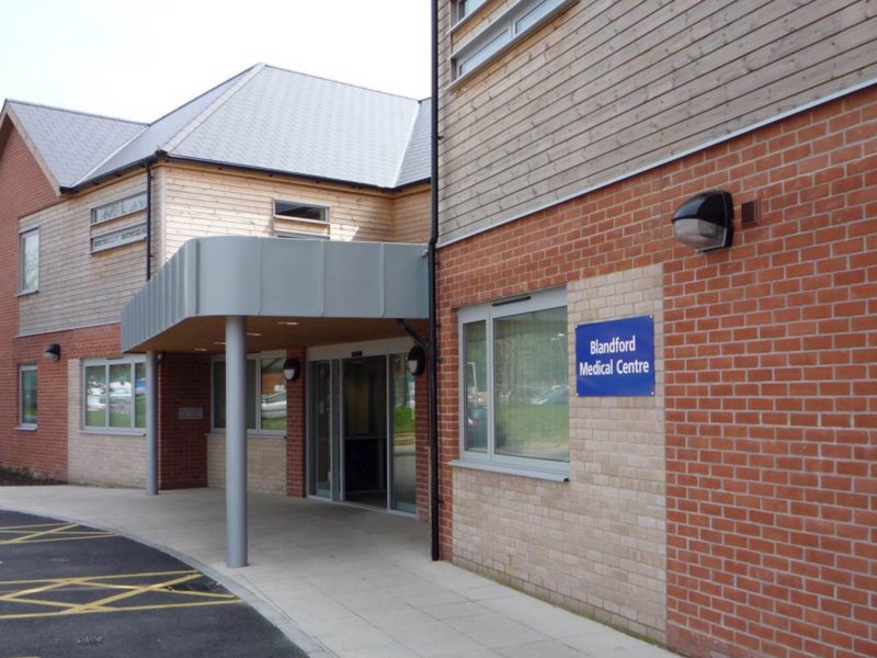 The image shows the entrance to Blandford Medical Centre